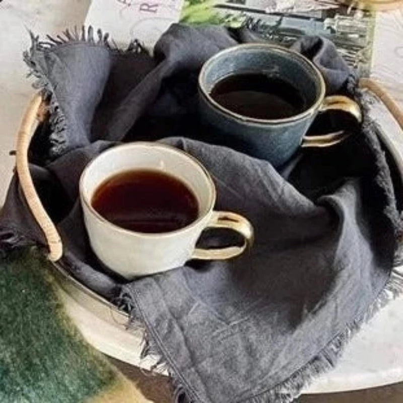 Ariel coffee mugs on tray with coffee