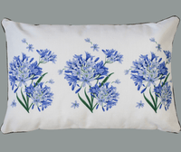 Thumbnail for A blue and white Agapanthus Cushion with flowers on it from LaVida.