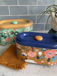 Thumbnail for Two Spring Floral Storage Tins with LaVida designs on top of a counter.
