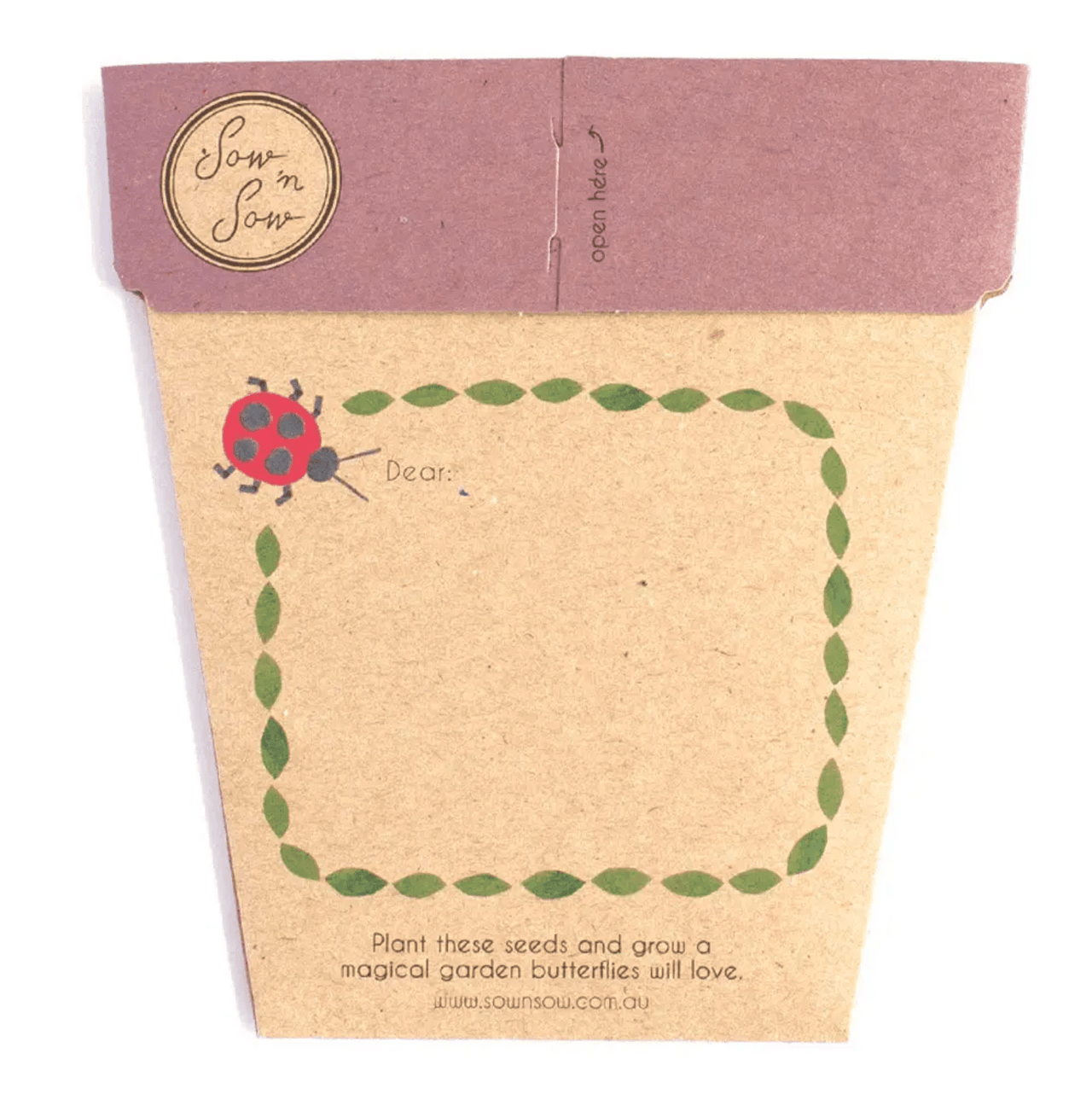 A Sow n Sow Seeds - Enchanted Garden plant pot with a label on it.