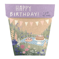 Thumbnail for A Seeds - 'Happy Birthday' Picnic from Sow n Sow with a cake and flowers in a pot.