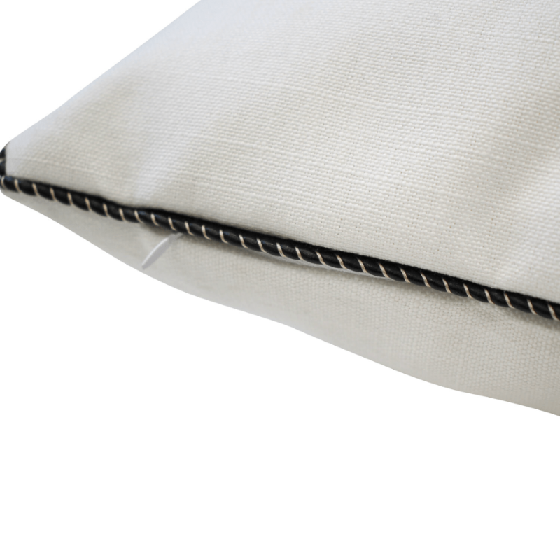 A white Agapanthus Cushion with black stitching by LaVida.