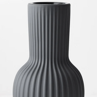 Thumbnail for A Floral Interiors Annix Tall Vase - Steel with a ribbed design.
