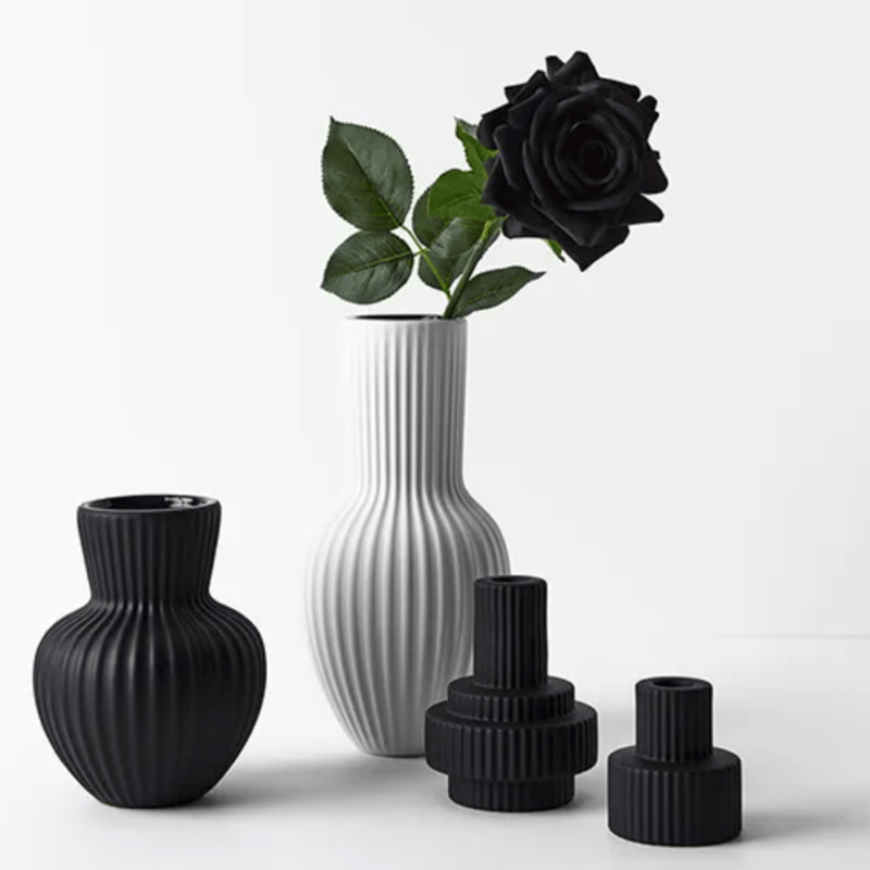 Annix tall vase white with flower and two black candle holders and black vase