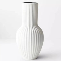 Thumbnail for An Annix Tall Vase - White by Floral Interiors on a white surface.