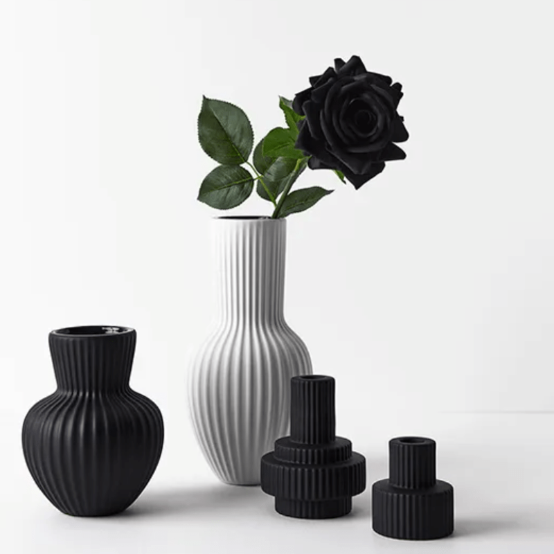 Collection of vases including the Annix2 vase in black
