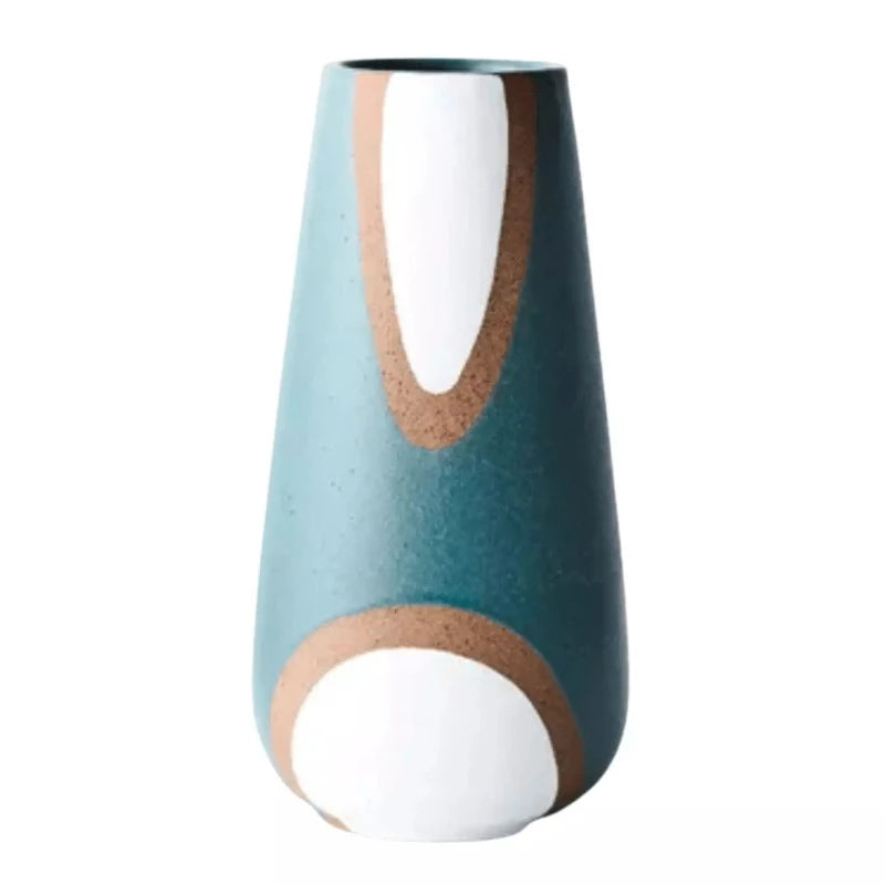 A Babua Vase - Aqua with a white and brown design by Floral Interiors.