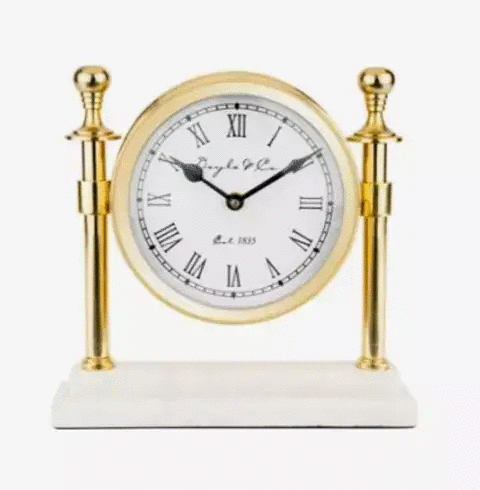 A Column Clock with White Marble Base - Gold, brand by Flair Gifts, with roman numerals.