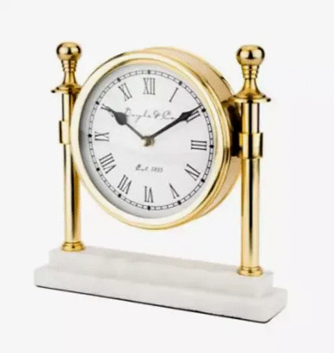 A Column Clock with White Marble Base - Gold by Flair Gifts with roman numerals.
