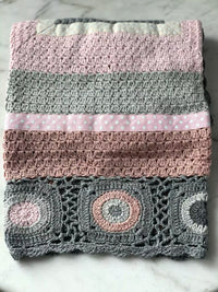 Thumbnail for A Hand Crochet Blanket - Dusty Pink / Beige / Grey by and the little dog laughed on a marble table.