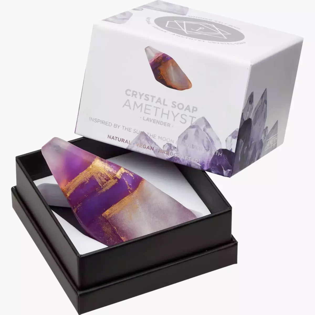 Enhance your bathing experience with this luxurious Crystal Soap - AMETHYST - Lavender from Summer Salt Body. Crafted with a genuine Amethyst Crystal, this soap not only cleanses your skin but also helps to ward off negative energy.