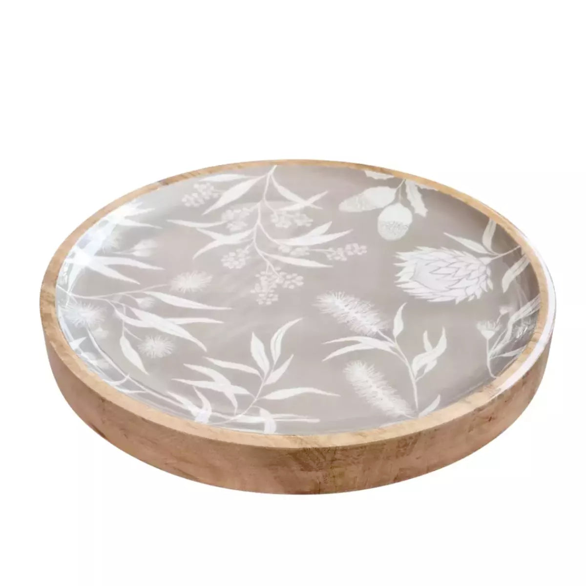 A Bindi Round Serving Tray with a floral design, made from natural materials by j.elliot.