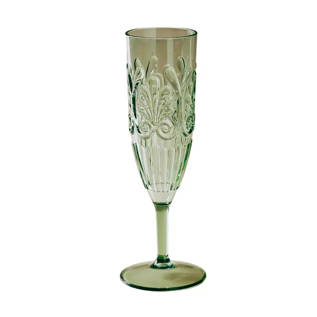 An Indigo Love Flemington Acrylic Champagne Flute - Sage Green with an ornate design on it.