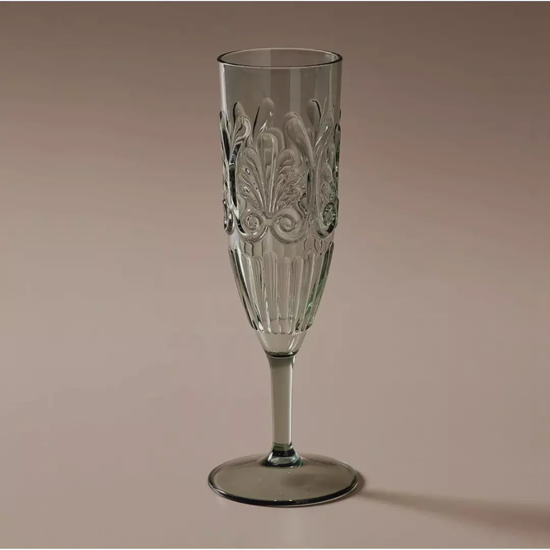 An Indigo Love Flemington Acrylic Champagne Flute - Sage Green with a design on it.