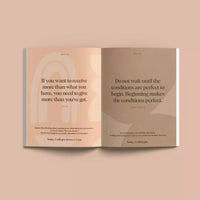 Thumbnail for An open book with a quote on a beige background, featuring Daily Mantras to Ignite Your Purpose Second Edition by Collective Hub.
