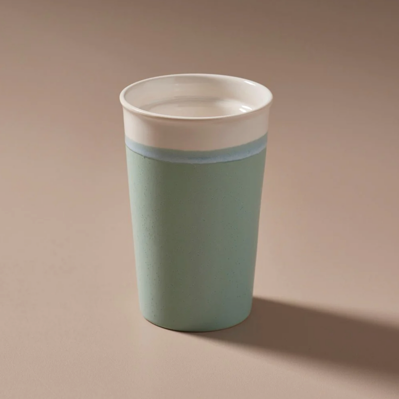 An Indigo Love Keeper Cup - Ceramic - Marine, designed to save the planet.