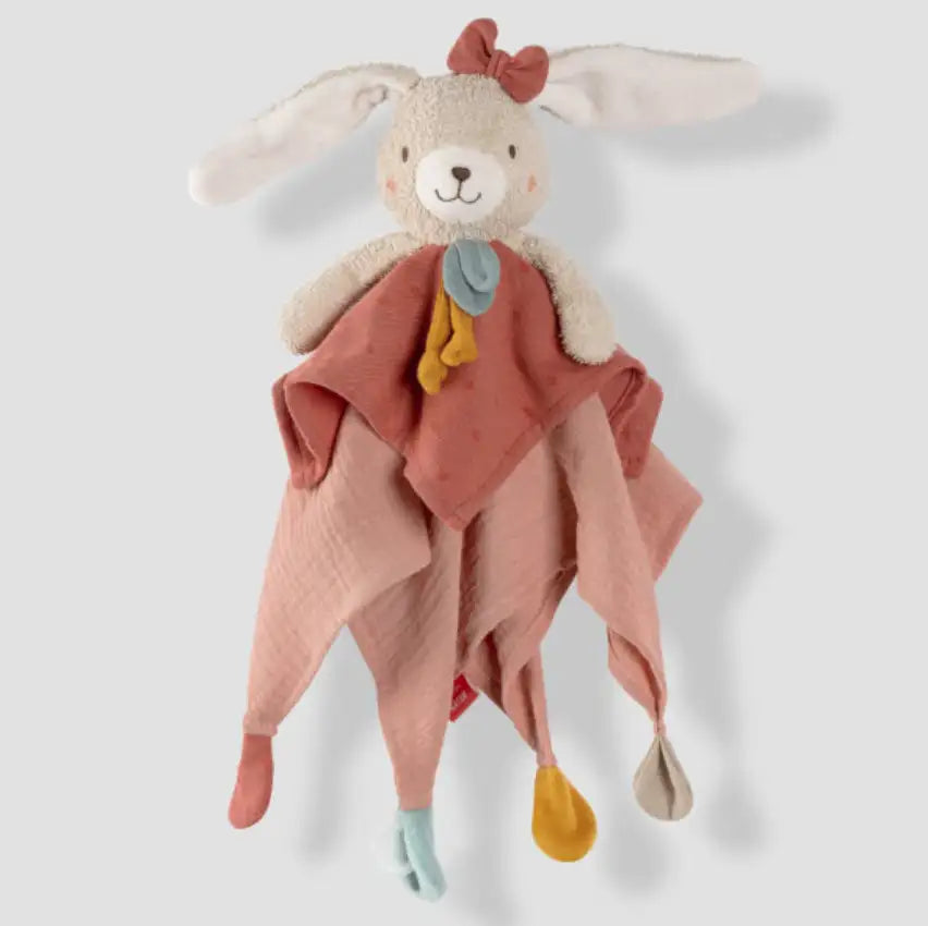 The Pilbeam FehnNATUR Comforter Hare is a plush security blanket with a white bunny head, long ears, pink bow, and pastel fabric squares with knotted corners—ideal for sensory development and cuddly comfort.