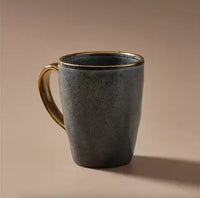 Thumbnail for A Senseo Mug - Matt Charcoal by Indigo Love on a beige background.