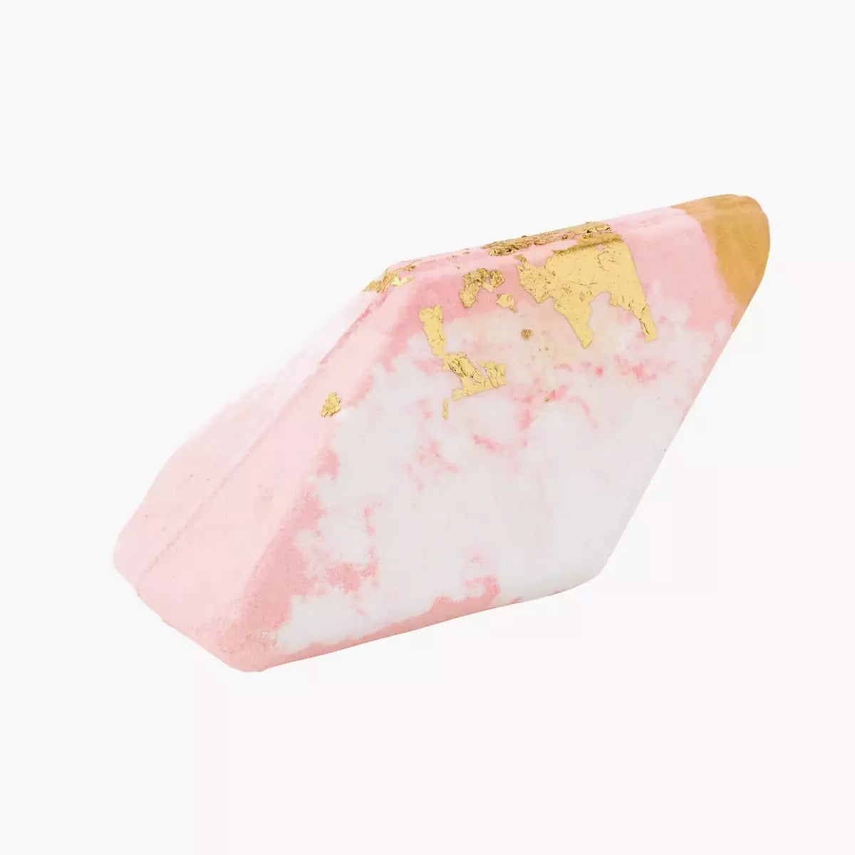A Crystal Bath Bomb - Rose Quartz - Jasmine infused with Summer Salt Body's Jasmine essential oils, perfect for nourishing the skin. Placed on a white surface, it creates a luxurious ambiance.