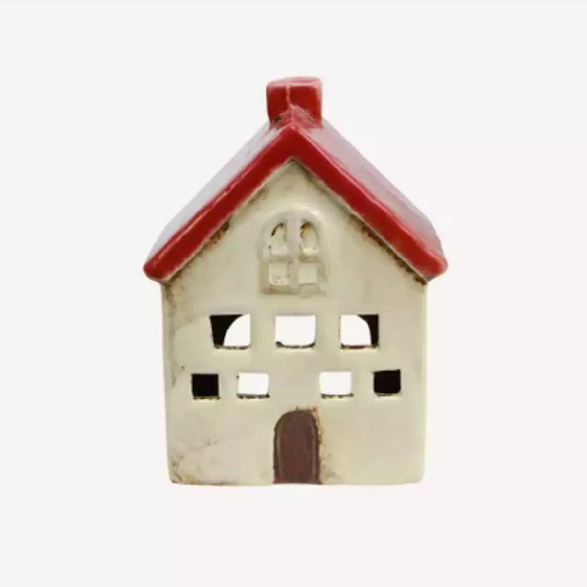 A charming French Country Collections Christmas Village Villa, perfect as a Tea Light Holder, sitting on a pristine white background.