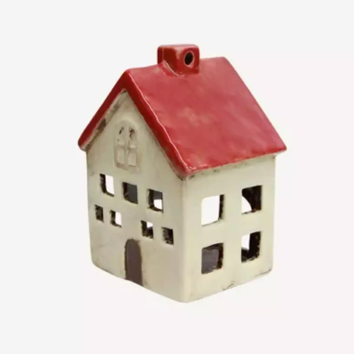 A French Country Collections Christmas Village Villa, a ceramic house ornament with a red roof, perfect for a Christmas village or as a tea light holder.